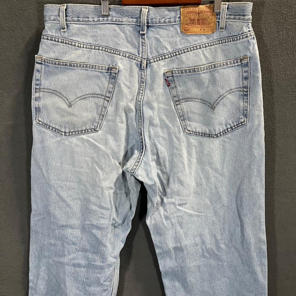 Vintage Levis 550 Relaxed Fit Jeans Light Wash Denim 38x32 Distressed 90s Mens